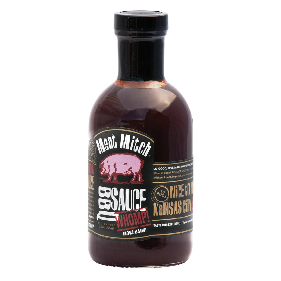 Meat Mitch Whomp! BBQ Sauce bottle ready for glaze on ribs