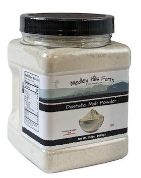 Measuring Medley Hills Farm malt powder for consistent baking results.