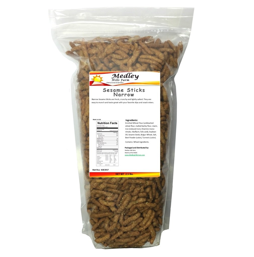 Medley Hills Farm sesame sticks narrow bag close-up shows fresh, crisp texture for snacking.
