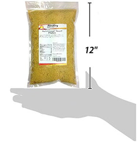 Medley Hills Farm Nutritional Yeast Flakes poured onto popcorn for a savory lift.