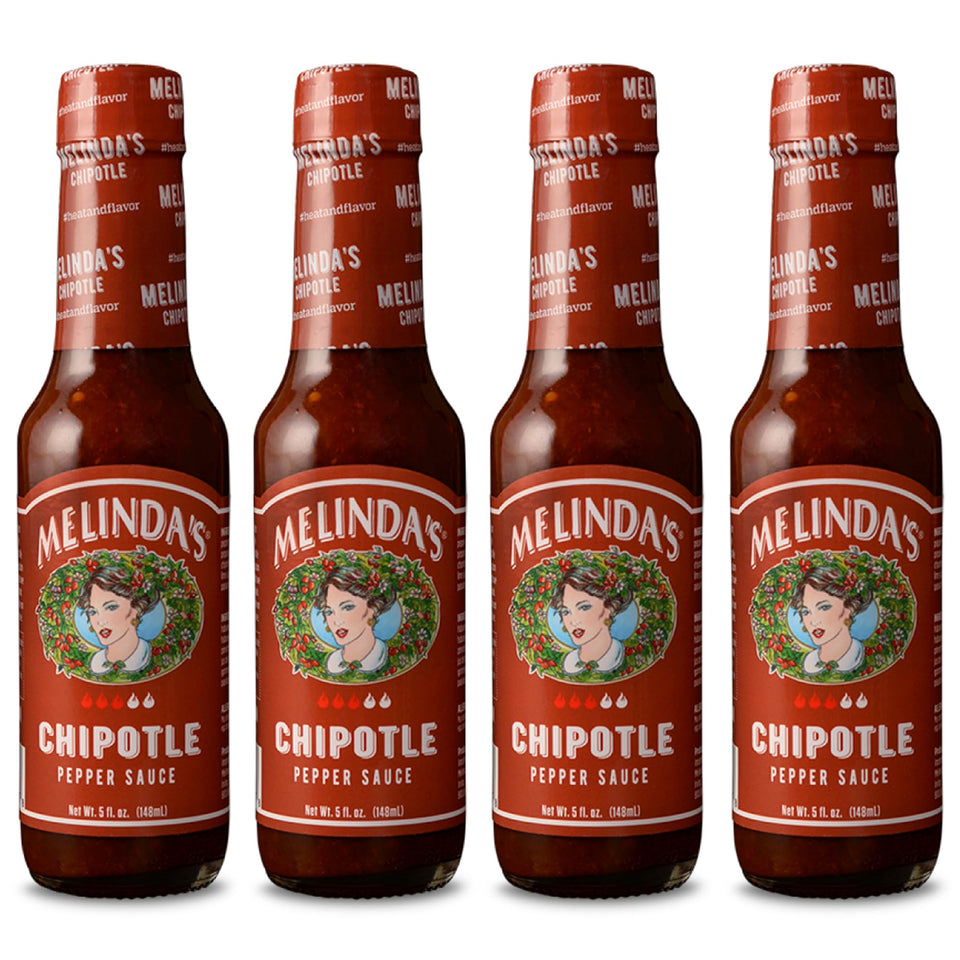 Pour Melinda's Chipotle Hot Sauce over tacos for smoky heat.
