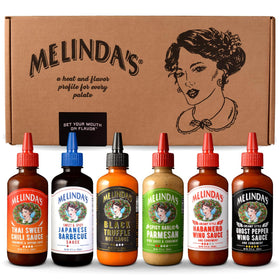 Melinda’s Craft Wing Collection box displaying six sauces for versatile wing nights