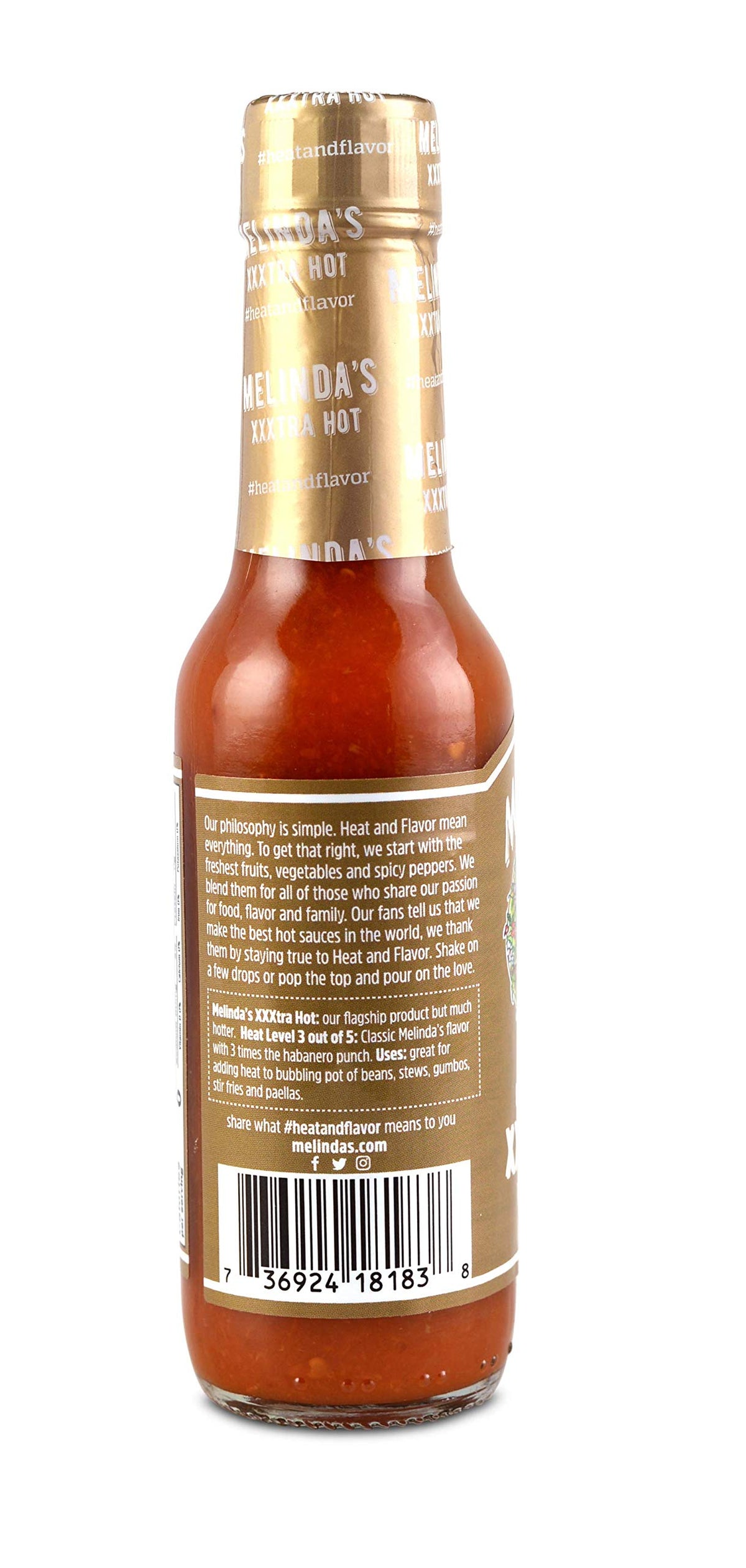 Label close-up showing keto, vegan, gluten-free attributes on Melinda’s bottle.