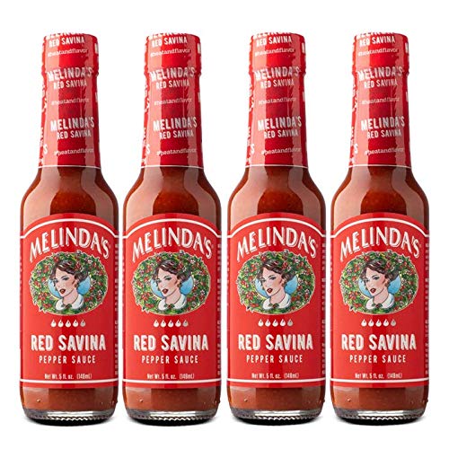 Melinda’s Red Savina hot sauce bottle with bold label delivering fiery heat.