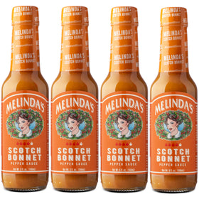 Melinda’s Scotch Bonnet hot sauce bottle ready to elevate grilled dishes.