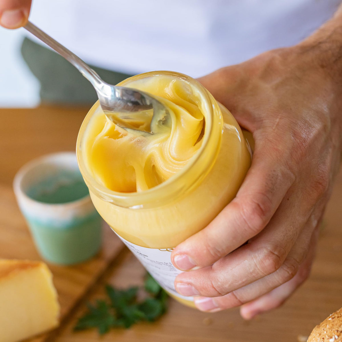 Mellona creamy golden honey highlights a smooth spread for toast and desserts.