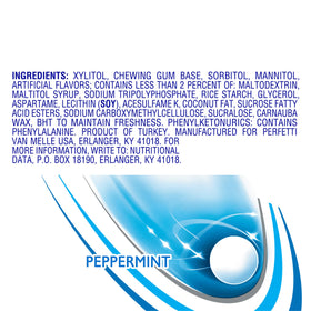 Mentos Always White gum bottle on desk for convenient refreshment at work.
