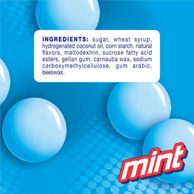 MENTOS Chewy Mint candy roll closeup texture emphasizes soft chew and refreshing flavor