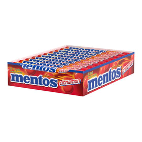 Mentos Cinnamon Chewy Rolls on a desk provide a quick refresh during study.