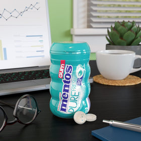 MENTOS curvy bottle shown for desk, car, or travel use.