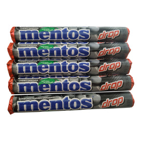 Mentos Licorice bite close-up reveals texture and premium snacking option.