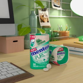 Recyclable symbol on Mentos Pure Fresh bottle for eco-friendly choice.