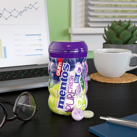 Mentos grape medley gum piece showing fruity flavor and sugar-free chew