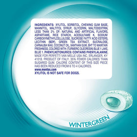 MENTOS wintergreen gum packaging emphasizes xylitol ingredient and freshness.