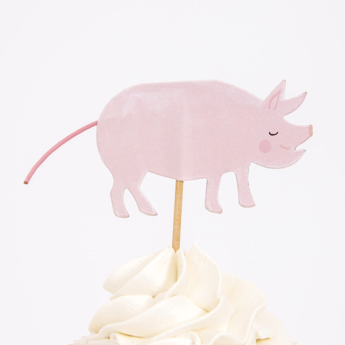 Meri Meri On The Farm pig topper brings whimsy to celebration treats