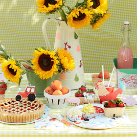 Meri Meri On The Farm tractor topper enhances festive farmyard cupcakes