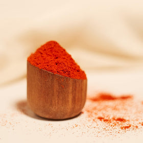 MEROPS paprika bag open with spoon for quick, measured seasoning