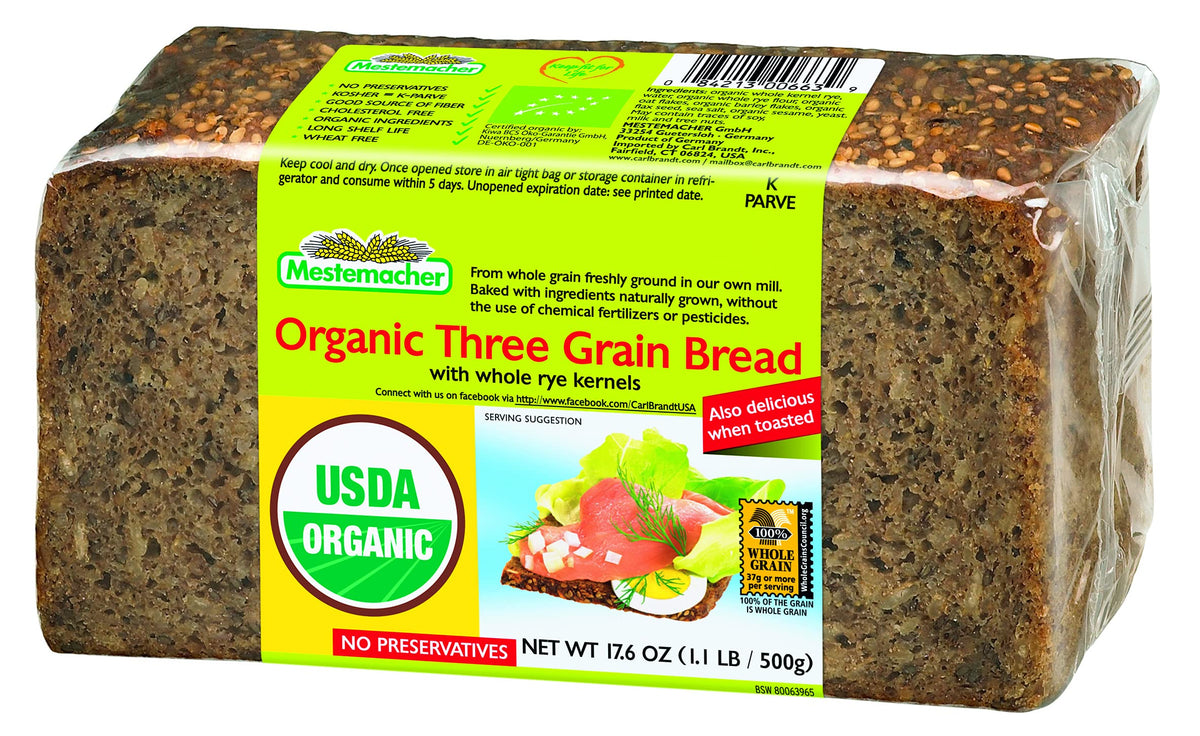 Mestemacher Whole Grain Bread, oven-fresh crust, organic three-grain loaf ideal for sandwiches.