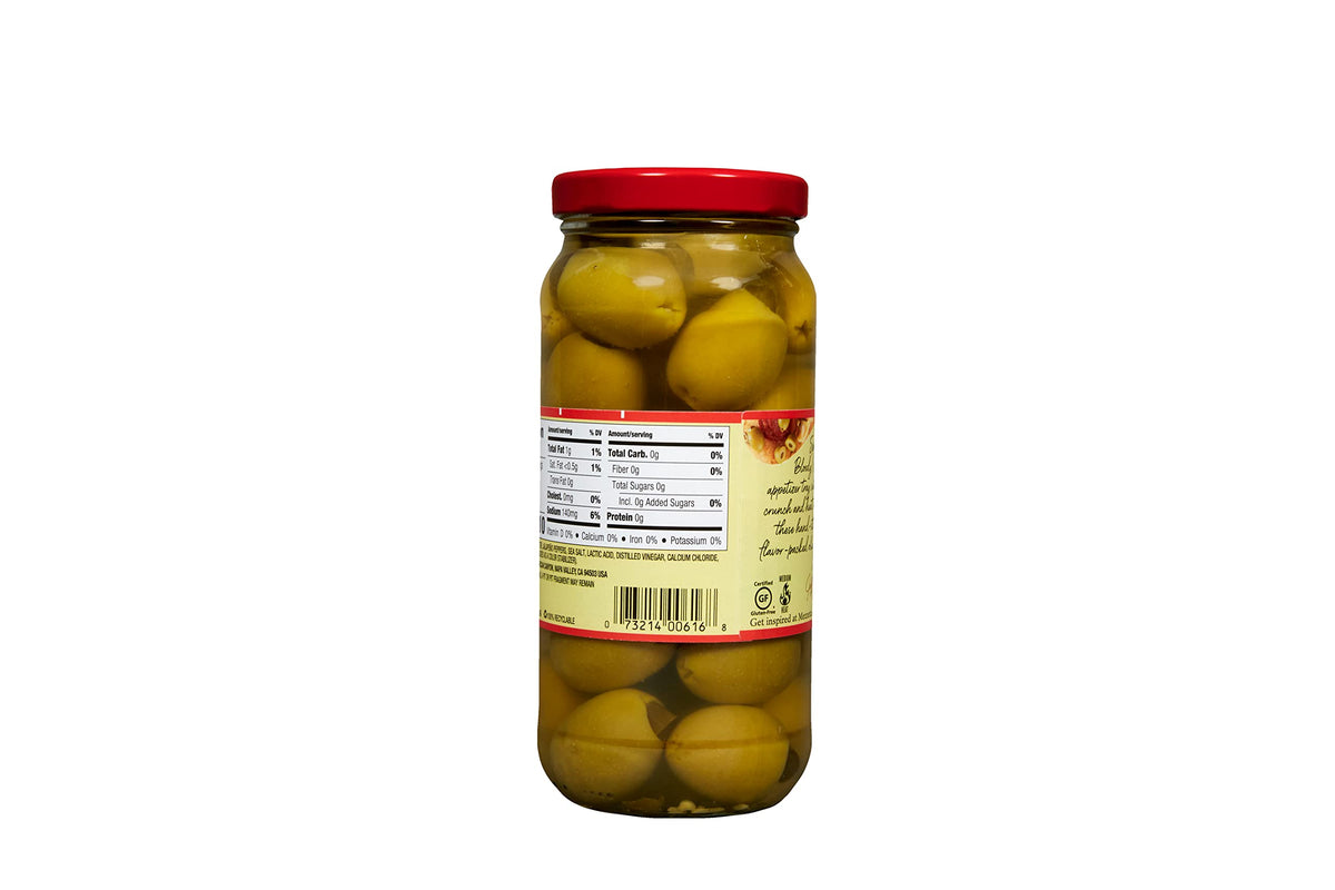 Mezzetta jalapeño stuffed olives jar on table, ready for entertaining.