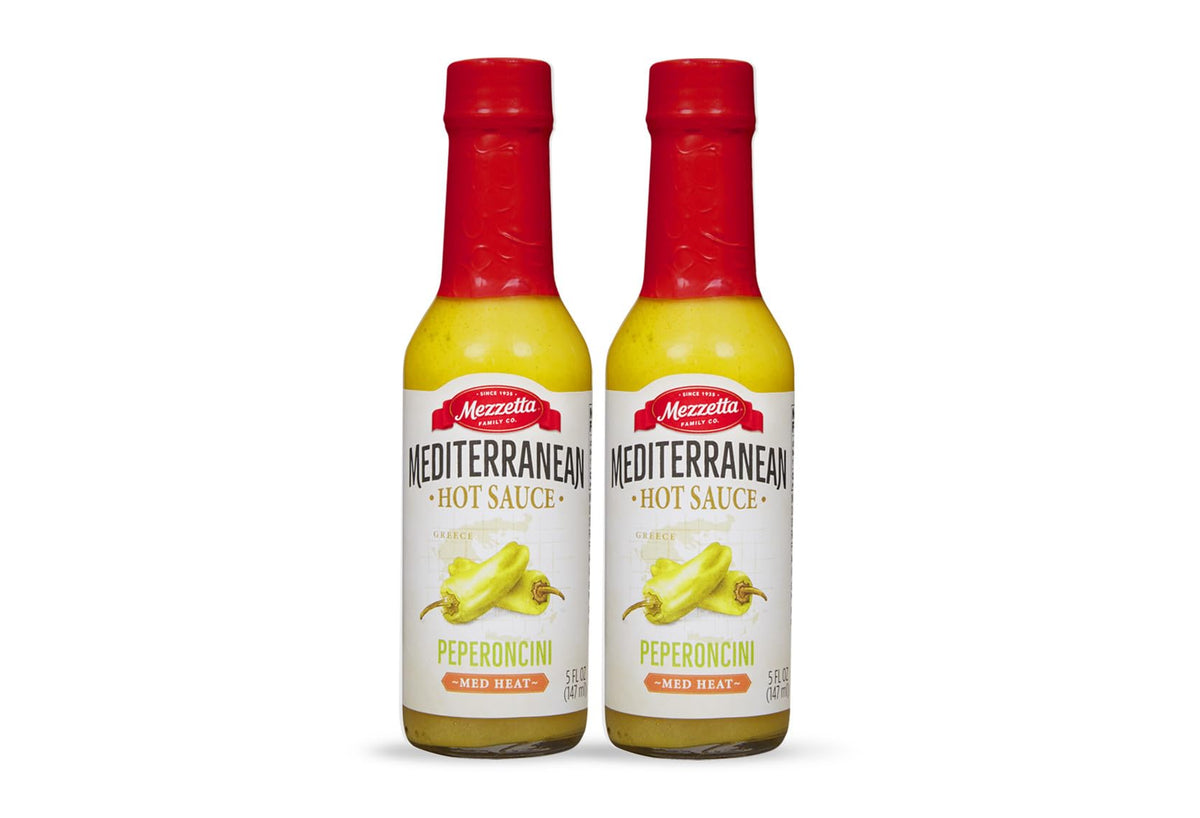 Mezzetta Peperoncini Sauce bottle close-up with Mediterranean heat for bold flavors.