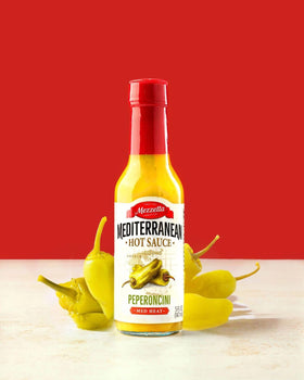 Mezzetta Peperoncini Sauce over dishes highlights vibrant pairings for chicken and vegetables.