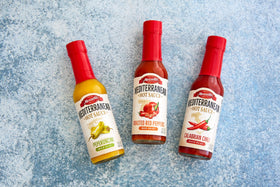 Mezzetta Peperoncini Sauce being poured, ready to spice meals.