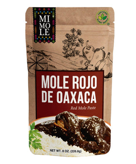 Mi Mole Rojo Oaxaca bottle pour — convenient, rich mole base for quick weeknight dinners.