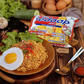 Mi Sedaap Mi Goreng pack-open shows quick-prep convenience for busy evenings.