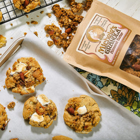 Close-up of crunchy clusters from Michele’s Granola showing texture and almond swirls.