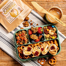 Vegan and gluten-free certification label on Michele’s Granola.