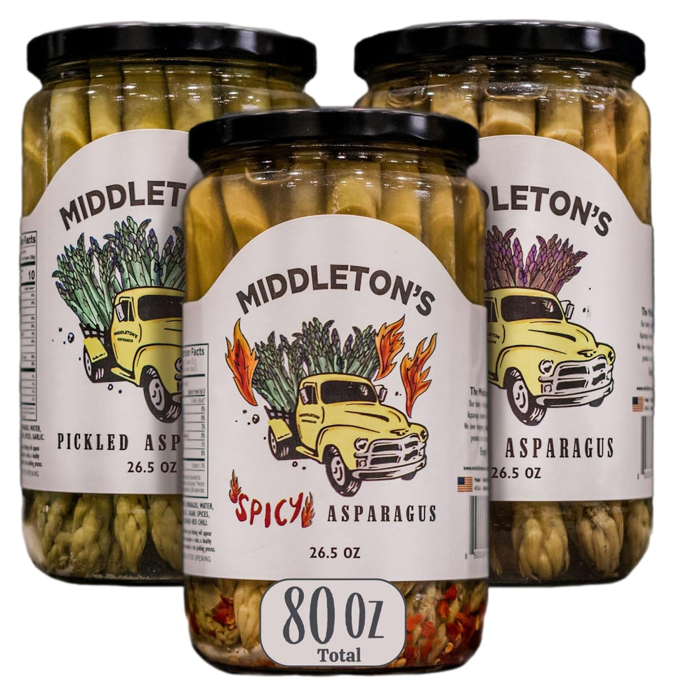 Middleton's pickled asparagus green jar on a snack board, crisp and tangy.