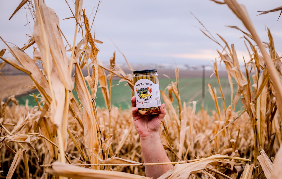 Middleton's pickled asparagus on a tasting board, perfect for entertaining guests.