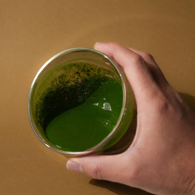 Vibrant green matcha color indicating premium ceremonial-grade powder ready to whisk