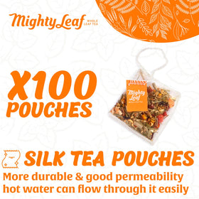 Mighty Leaf Chamomile Citrus pyramid pouch close-up reveals whole leaf blooms for rich flavor.
