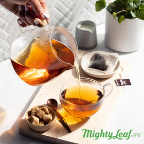 Mighty Leaf Green Tea Tropical hot or iced for versatile serving options.