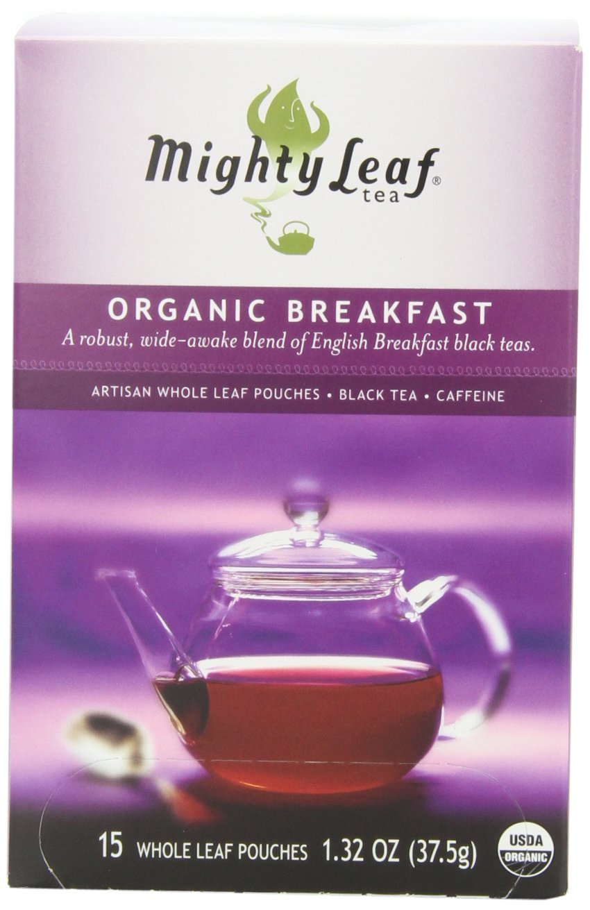 Mighty Leaf Organic Breakfast Black Tea silken pouches unfurling for rich aroma.