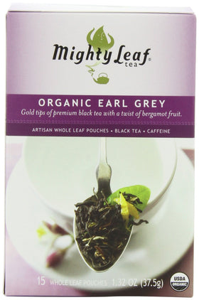 Mighty Leaf Organic Earl Grey silk pouch close-up showing full-leaf unfurling aroma.
