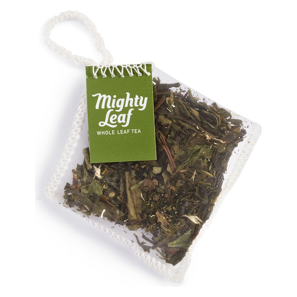 Mighty Leaf White Orchard fruit-infused tea highlighting melon and peach aroma for a refreshing cup.
