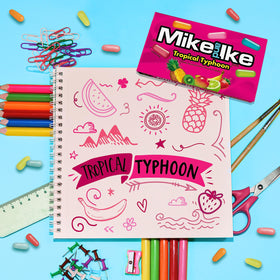Friends enjoying MIKE AND IKE Tropical Typhoon during a movie night.