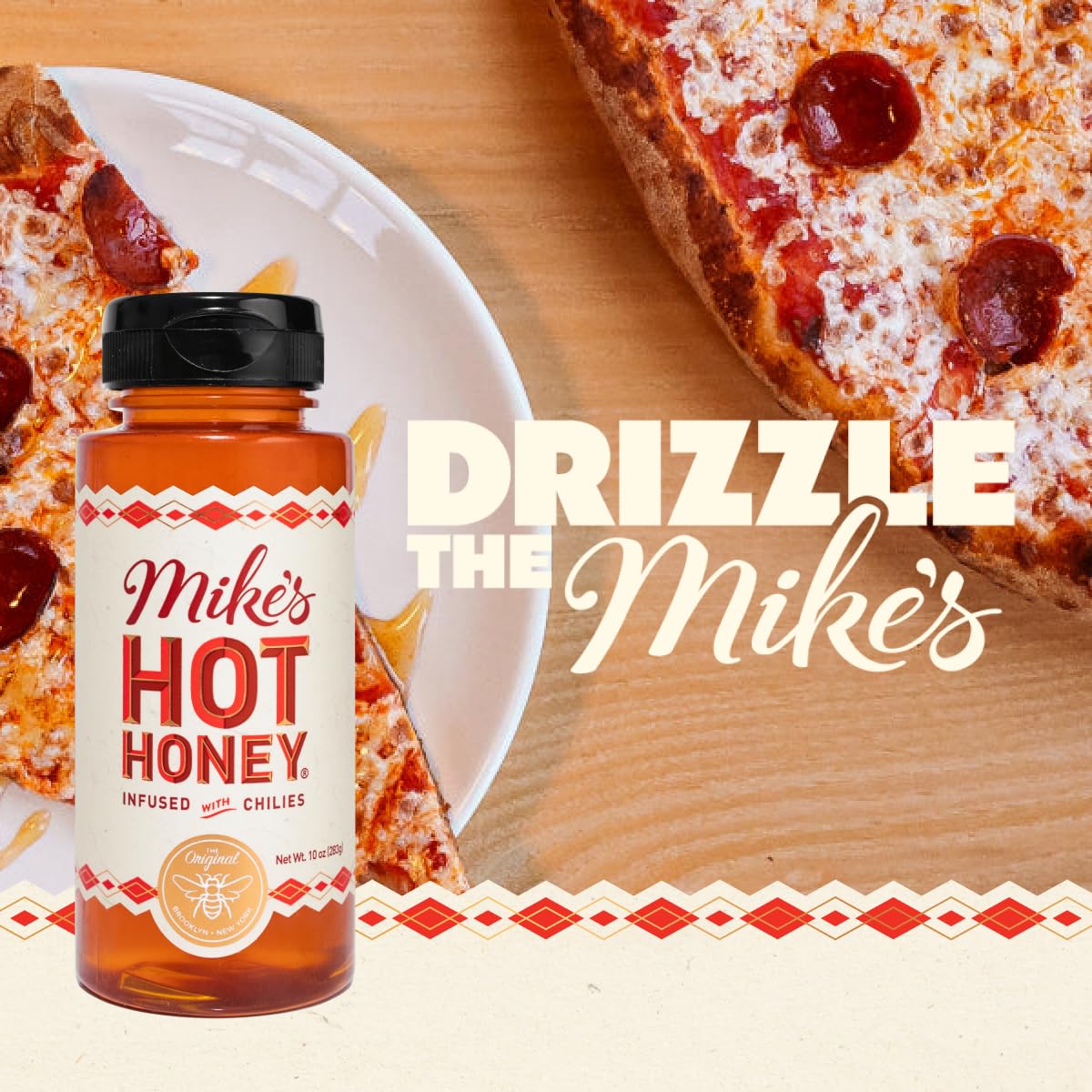 Close-up pour from Mike's Hot Honey original bottle highlighting drizzle control.
