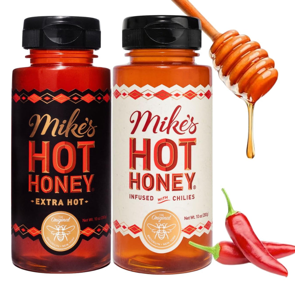 Mike's Hot Honey Original bottle pour showing sweet heat on pizza.