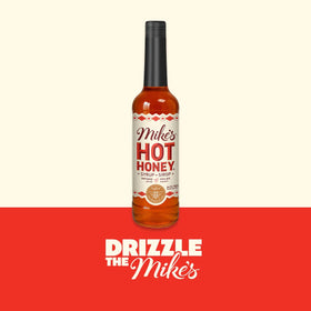 Mike's Hot Honey Original bottle in lemonade, delivering subtle sweetness with a spicy kick.