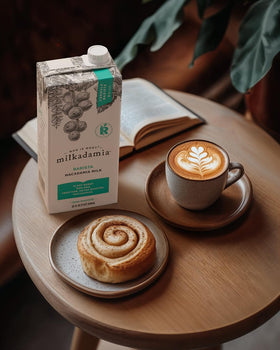 Milkadamia Barista Macadamia Milk poured into coffee for a smooth, creamy finish.