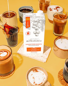 Milkadamia Unsweetened Barista Macadamia Milk poured into coffee for balanced flavor.