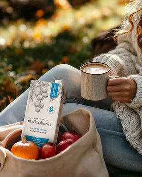 Milkadamia unsweetened macadamia milk label emphasizes vegan, dairy-free qualities.