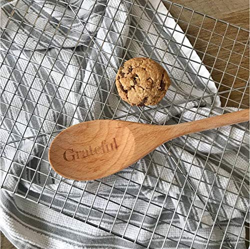 MilkBliss Lactation Cookie Mix ingredients closeup, oats, flaxseed and natural components visible.