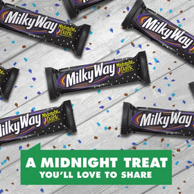 Cross-section shows nougat, caramel, and dark chocolate in Milky Way Midnight Dark.