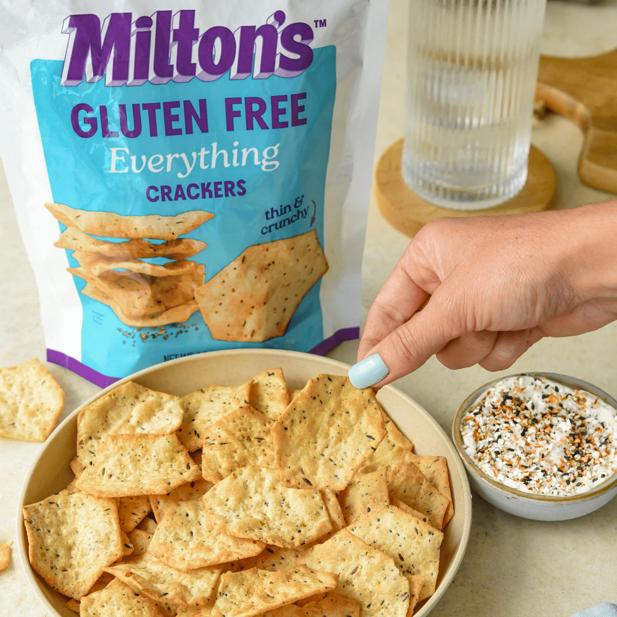 Milton’s Craft Bakers Crackers Snack Board ready, pairs with cheese and toppings.