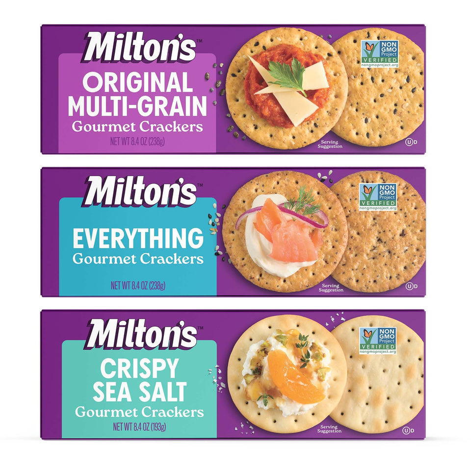 Milton's Gourmet Crackers original multi-grain on a cheese board offering wholesome crunch.