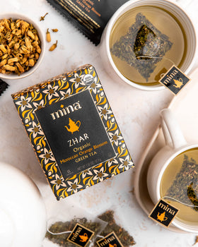 Mina floral citrus infusion visual suggests refreshing drink.